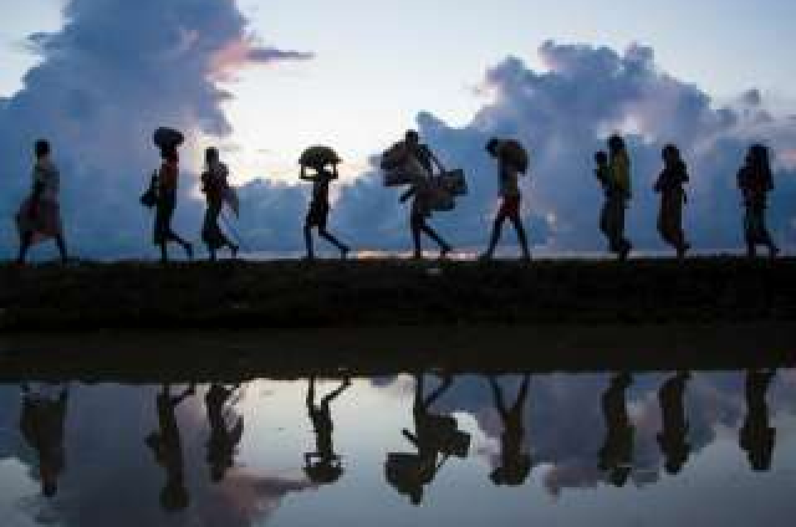 migranti-320x220-min