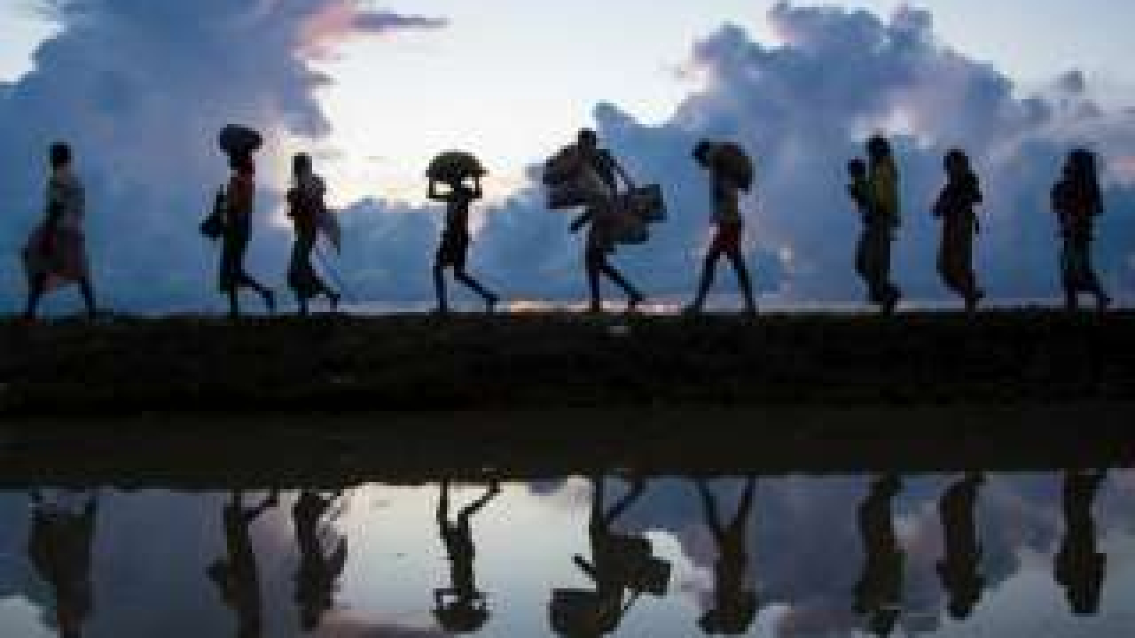 migranti-320x220-min